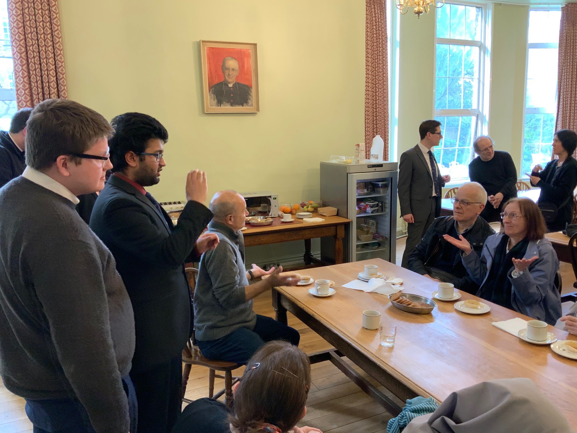 Refreshments after Mass in the seminary dining room. Seminarians chatting to members of the Deaf Community.